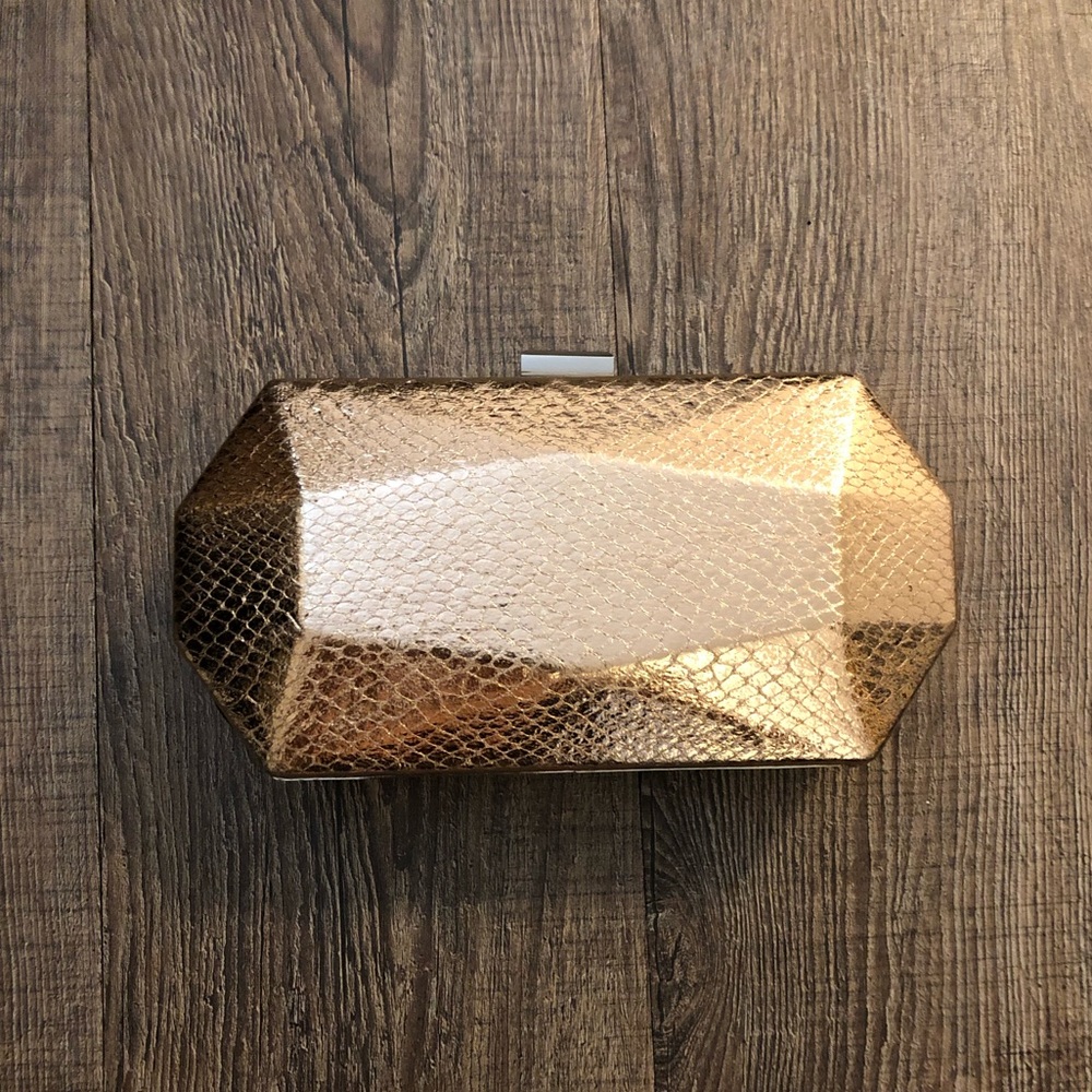 Rose gold textured geometric clutch